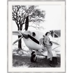 Vogue Magazine 'Keira Knightley Leaning On Plane' By Arthur Elgort, June 2007
